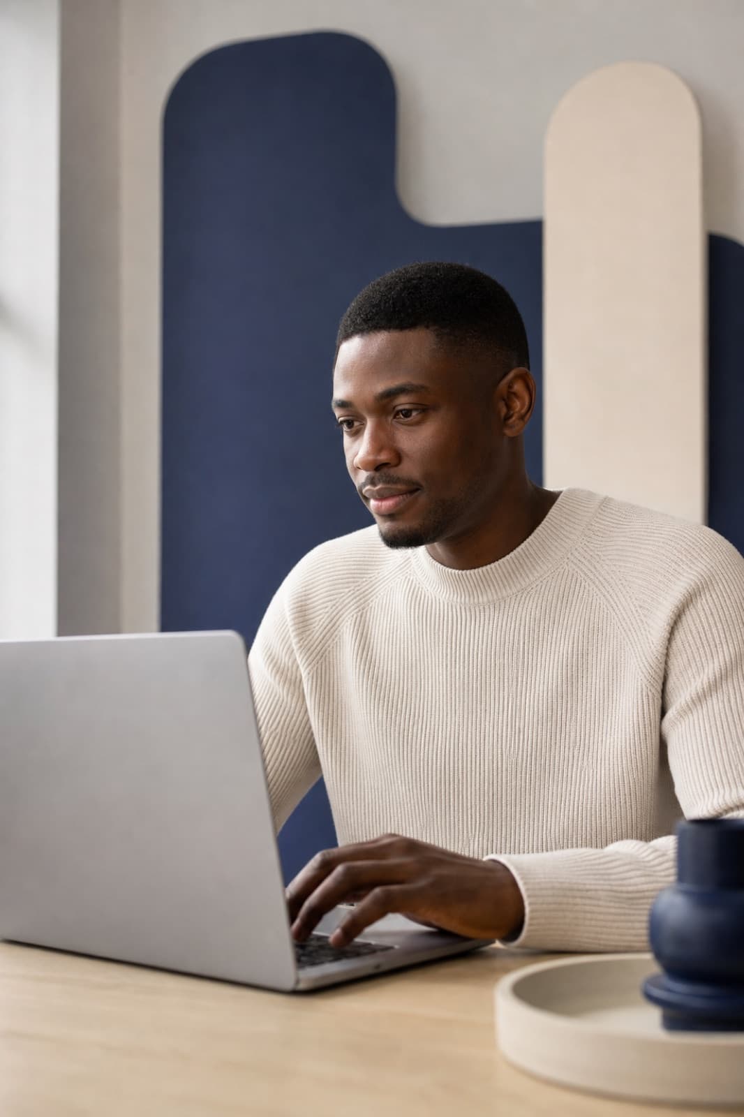 A freelancer working at his laptop